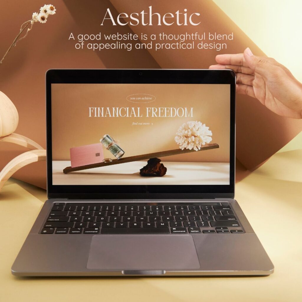 Image of a website on a laptop reading "Aesthetic, A good website is a thoughtful blend of appealing and practical design."